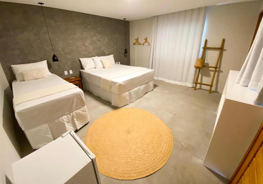 Suíte Pedra Triplo - Pousada Baobá